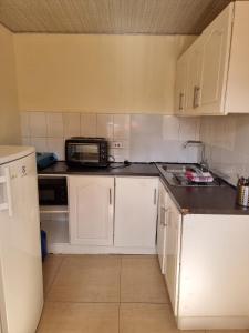 Køkken eller tekøkken på Hideout in Highlands