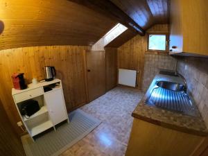 Kuchyň nebo kuchyňský kout v ubytování Panorama Apartment