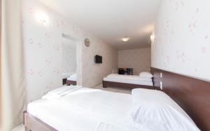 Postel nebo postele na pokoji v ubytování Hotel Hayat Hills