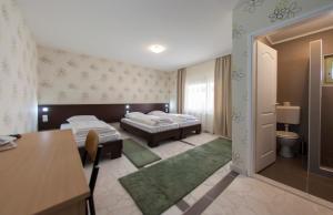 Postel nebo postele na pokoji v ubytování Hotel Hayat Hills