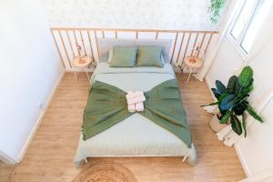 En eller flere senge i et værelse på O seu refúgio no coração de Belém