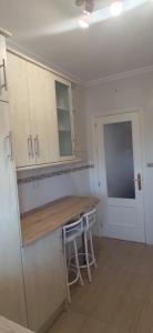 Kuchyňa alebo kuchynka v ubytovaní Apartamento en primera línea de playa, con vistas a la playa y con wifi