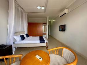 Μια τηλεόραση ή/και κέντρο ψυχαγωγίας στο Iman Hotel +65 φωτογραφίες