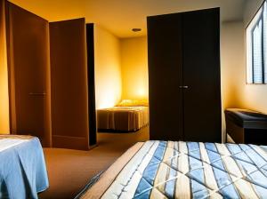 Ένα ή περισσότερα κρεβάτια σε δωμάτιο στο Casa Quico 5
