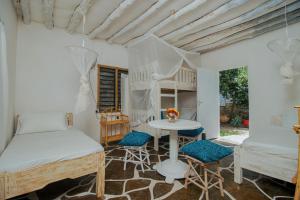 Posezení v ubytování Sunny garden rooms Watamu