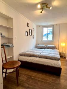 Postel nebo postele na pokoji v ubytování Chalet im Wallis
