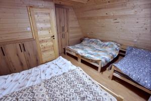 Postel nebo postele na pokoji v ubytování Gorska vila Vasilija