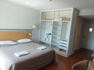Ένα ή περισσότερα κρεβάτια σε δωμάτιο στο Mendozinn APARTMENTS