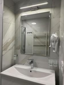 Vannituba majutusasutuses Magnet Apartment