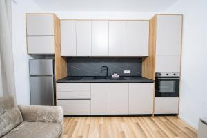 Η κουζίνα ή μικρή κουζίνα στο Leka Apartment