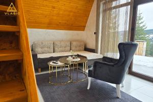 Posezení v ubytování Weekend house - Vlašić