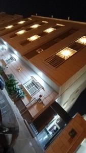 an overhead view of a building with lights at best rest apartments - 3 in Riyadh