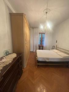 Postel nebo postele na pokoji v ubytování Casa Rossino relax in Monferrato