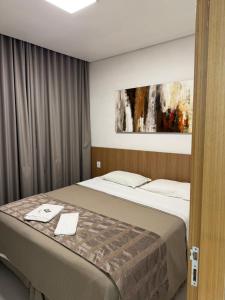 Postel nebo postele na pokoji v ubytování Hotel Conexão Pampulha + 19 fotografií