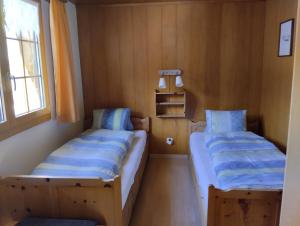 Postelja oz. postelje v sobi nastanitve Chalet Gärlich