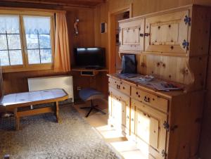 TV in/ali zabaviščno središče v nastanitvi Chalet Gärlich