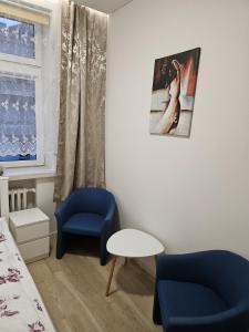 Χώρος καθιστικού στο Kauno Apartamentai su balkonu