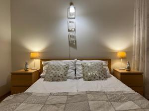 Posteľ alebo postele v izbe v ubytovaní Apartament Królewski Superior z sauną