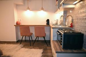 Kuchyň nebo kuchyňský kout v ubytování GOURA House