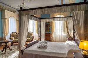 Una cama o camas en una habitación de Villa Collini 23 fotos más