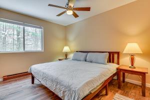 a bedroom with a bed and a ceiling fan at Ski, Hike and Golf Pet-Friendly Windham Retreat in Windham