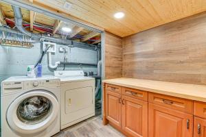 a laundry room with a washer and dryer at Ski, Hike and Golf Pet-Friendly Windham Retreat in Windham