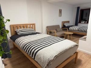 Postel nebo postele na pokoji v ubytování Ferienwohnung Neroth