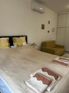 Postel nebo postele na pokoji v ubytování Életfa Pihenő Apartman