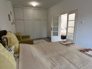 Postel nebo postele na pokoji v ubytování Életfa Pihenő Apartman