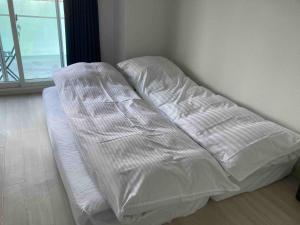 Postel nebo postele na pokoji v ubytování 【302号室】小樽キャナルビュー AMS東雲
