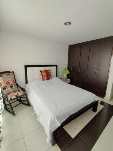 Giường trong phòng chung tại Casa cerca Centro, Salida Parque del Café, Panaca a minutos de Salento y Filandia rentalsOP Q01