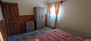 Ένα ή περισσότερα κρεβάτια σε δωμάτιο στο valle escondido