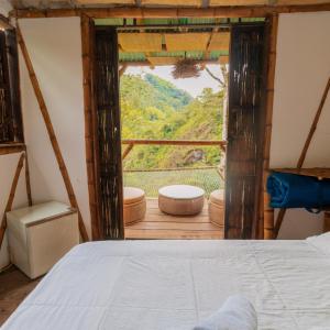 A bed or beds in a room at Victoria Ecolodge Még 1 kép