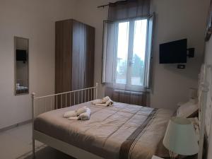 Letto o letti in una camera di B&B Dream Inn