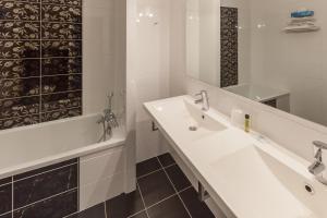 Koupelna v ubytování Hotel Alienor