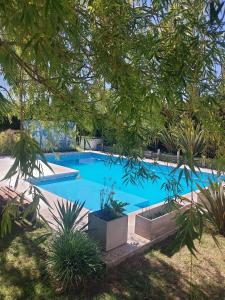 Swimmingpoolen hos eller tæt på Complejo Arenas