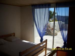 Posteľ alebo postele v izbe v ubytovaní Apartment with Terrace