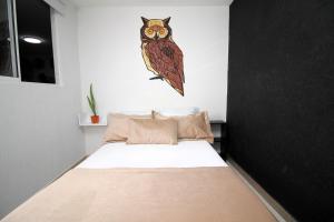 Voodi või voodid majutusasutuse DAM Hotel Pereira toas