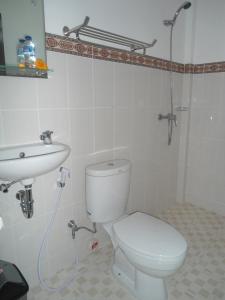 Ett badrum på Uma Taman House