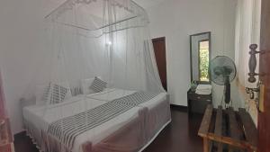 Postel nebo postele na pokoji v ubytování Sunbeam Homestay