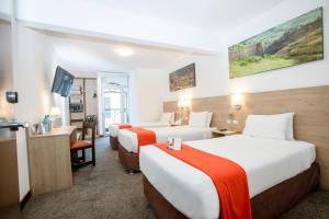 Кровать или кровати в номере Casa Andina Standard Cusco Catedral