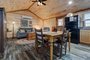 a kitchen and dining room with a table in a cabin at The Mountain Laurel in Stanton