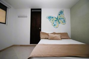 Voodi või voodid majutusasutuse DAM Hotel Pereira toas