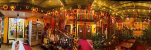a room with a lot of decorations on the wall at mam olson pensionne house in El Nido