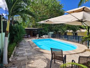 Bazén v ubytování Hotel Carlota Tamarindo nebo v jeho okolí