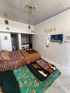 Postel nebo postele na pokoji v ubytování Homestay Ariksa
