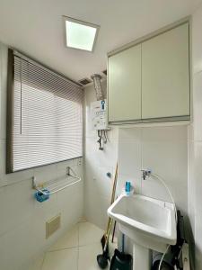 Ένα μπάνιο στο Loft com Praia e Lazer