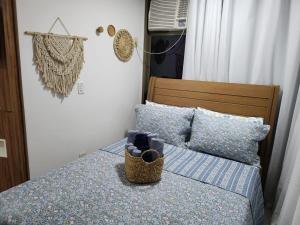 Ένα ή περισσότερα κρεβάτια σε δωμάτιο στο Loft com Praia e Lazer