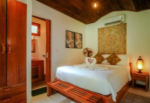 Postel nebo postele na pokoji v ubytování Amaya Boutique Resort