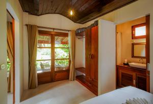 Postel nebo postele na pokoji v ubytování Amaya Boutique Resort